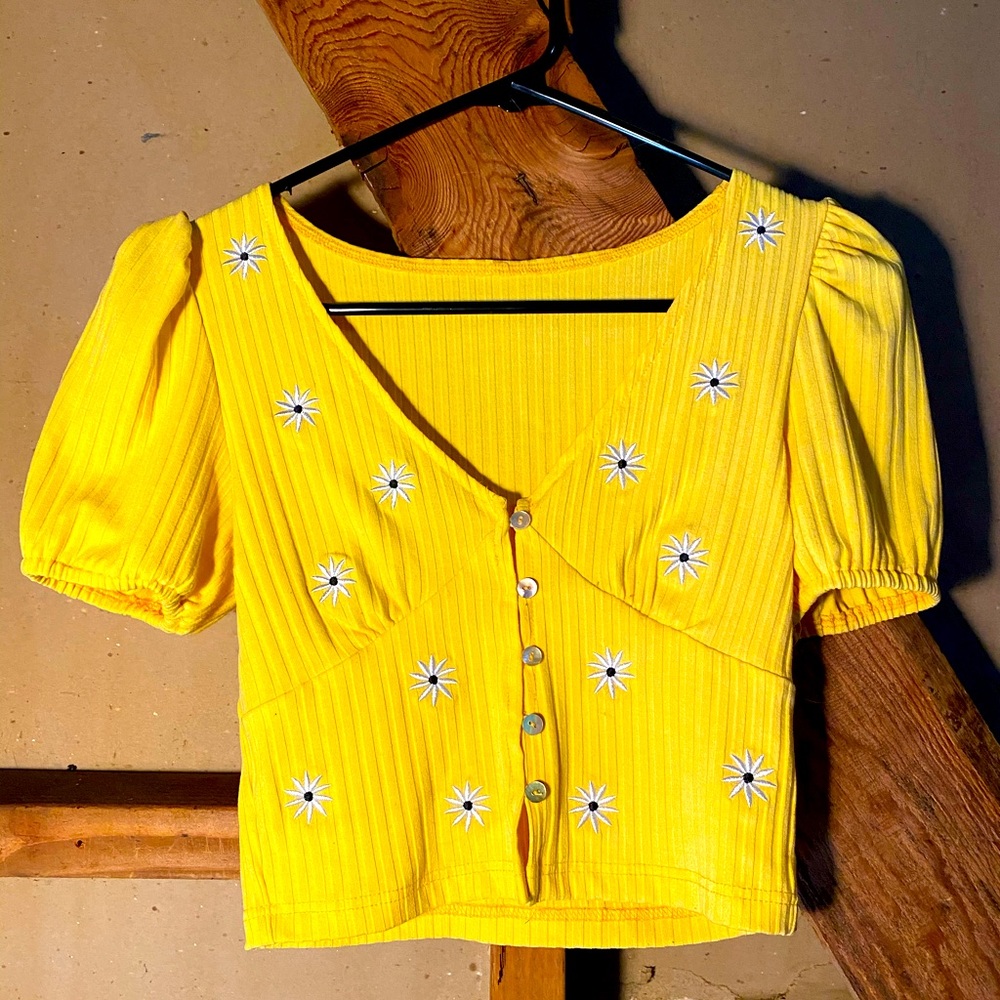 Small , floral yellow shirt
